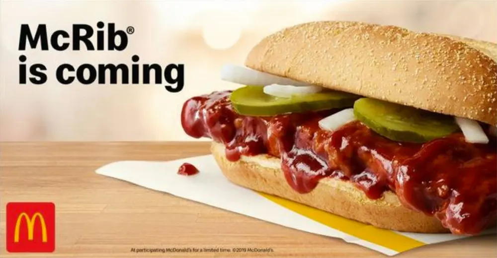 mc donalds ad showing a sub sandwhich saying McRib is coming